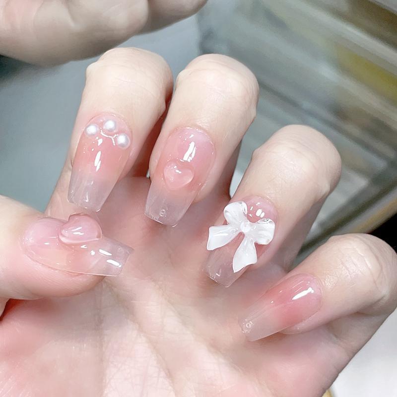 Autocollants pour ongles avec nœud court et blush